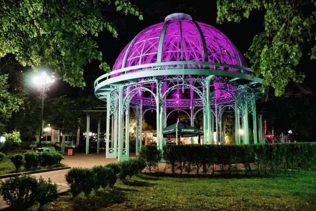 Mineral spring pavilion in Borjomi Central Park in the evening
