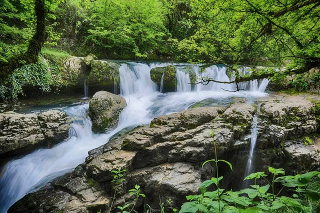 Waterfall and mossy cliffs in Martvili Canyon