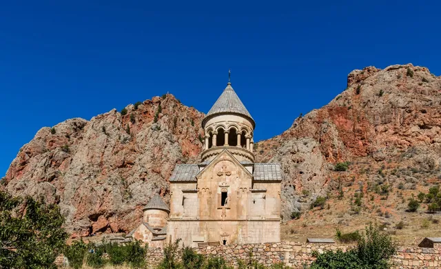 Surb Astvatsatsin church at Noravank against the cliffs